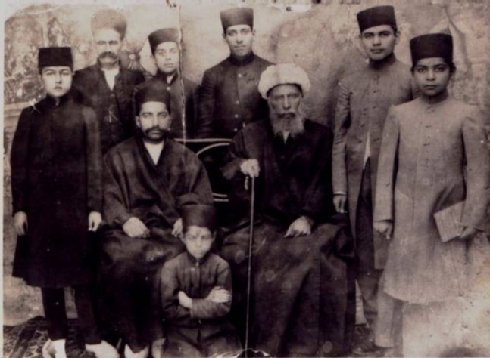 Fig. 8 Hakim Nasir family from Kermanshah and his son Mo‘azed al-Molk years after conversion into Islam - Courtesy of Nina Harouni Springer